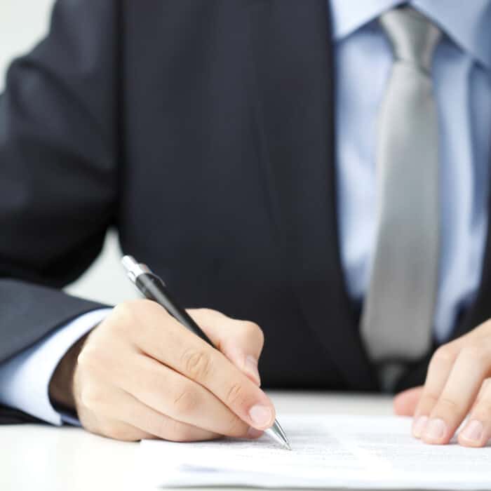 Man filling out TD-1000 form in Denver, CO